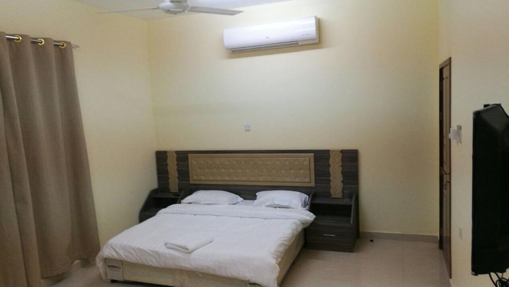 Stone Guest House Al 'Aqar Экстерьер фото